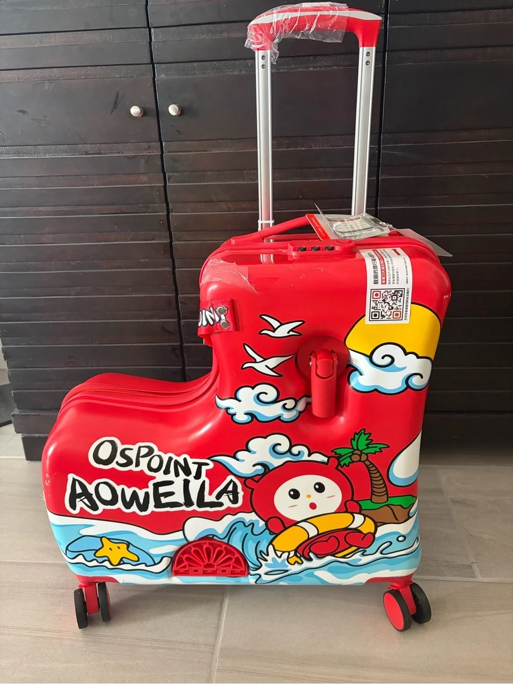 NWT Hard Side Ride-On 20” Luggage with Cartoon Island Beach Character